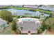 Aerial shot of the clubhouse amenities including a pool, spa, and sun loungers at 2336 Caravelle Cir, Kissimmee, FL 34746