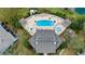 Aerial view of the community pool with a large pool, spa, and ample seating at 2336 Caravelle Cir, Kissimmee, FL 34746