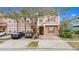 Townhome with a classic exterior, complemented by a private brick driveway at 2336 Caravelle Cir, Kissimmee, FL 34746