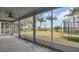 A beautiful screened-in porch overlooking a spacious backyard at 23431 Companero Dr, Sorrento, FL 32776