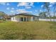 Spacious backyard with lush green grass and manicured lawn at 2875 E Slater Dr, Deltona, FL 32738