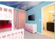 Bedroom with bunk beds and princess themed bathroom at 3312 Lilac Wa, Davenport, FL 33897