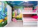 Bedroom with custom princess wall art, bunk beds, and pink accents at 3312 Lilac Wa, Davenport, FL 33897