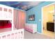 bedroom showing bunk beds, princess ceiling mural, and a bathroom at 3312 Lilac Wa, Davenport, FL 33897