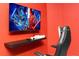 Cozy game room with wall mounted TV, floating shelf and comfortable gaming chair at 3312 Lilac Wa, Davenport, FL 33897