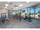 Well-equipped gym with modern machines and natural light, creating an invigorating workout space at 3312 Lilac Wa, Davenport, FL 33897