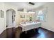 Bright dining room featuring wood floors and light fixtures at 4020 Shawn Cir, Orlando, FL 32826