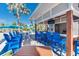 Outdoor bar featuring blue chairs, a TV, and a view of the water park at 4058 Lana Avenue, Davenport, FL 33897