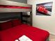 Cozy bedroom features a twin bunk bed with an awesome Lightning McQueen picture at 4058 Lana Avenue, Davenport, FL 33897