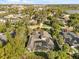 A spectacular aerial view of the house with the pool and beautiful landscaping at 470 Manor Rd, Maitland, FL 32751