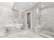 A luxurious bathroom featuring a soaking tub, glass shower, and beautiful tile floors at 470 Manor Rd, Maitland, FL 32751