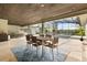 Covered outdoor dining area by the pool, perfect for Gathering dinners and entertaining at 470 Manor Rd, Maitland, FL 32751