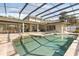 Backyard pool and entertaining area with outdoor kitchen, dining, and lounging at 470 Manor Rd, Maitland, FL 32751