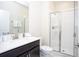 Modern bathroom featuring a glass-enclosed shower and contemporary vanity at 4844 Romeo Cir, Kissimmee, FL 34746