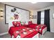 Mickey Mouse themed bedroom features two beds and playful decor at 4844 Romeo Cir, Kissimmee, FL 34746