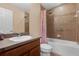 Bathroom featuring a sink vanity, shower, and toilet at 5150 Fiorella Ln, Sanford, FL 32771