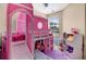 Bedroom with a pink tent bed at 5150 Fiorella Ln, Sanford, FL 32771