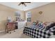 Bedroom with natural light, a desk, a dresser, and lots of stuff animals at 5150 Fiorella Ln, Sanford, FL 32771