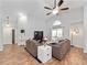 Cozy living room boasts vaulted ceilings, hardwood floors, and ample seating, creating a welcoming atmosphere at 629 Nighthawk Cir, Winter Springs, FL 32708