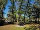 Charming picnic area nestled among trees, offering a peaceful setting for outdoor meals and gatherings at 629 Nighthawk Cir, Winter Springs, FL 32708