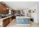 Bright kitchen with island, stainless steel appliances, tile backsplash and modern countertops at 630 Citrus Isle Blvd, Davenport, FL 33837