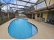 Relaxing screened in pool with deck, hammock, and plenty of space to relax at 6630 Abeydon Ct, Orlando, FL 32818