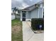 This single-Gathering home features a screened in entry for added curb appeal at 636 Bohannon Blvd, Orlando, FL 32824