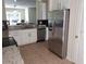 Bright kitchen showcasing stainless steel refrigerator and appliances and eat in space at 1008 Magnolia Blossom Ct, Apopka, FL 32712