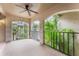 Charming balcony offering a relaxing outdoor space with lush greenery and serene neighborhood views at 1055 Kensington Park Dr # 111, Altamonte Springs, FL 32714
