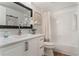 Bright bathroom featuring a vanity with marble countertop and a shower with a bathtub at 1055 Kensington Park Dr # 111, Altamonte Springs, FL 32714