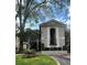 Attractive multi-story condo building with mature trees and manicured landscaping, providing curb appeal at 1055 Kensington Park Dr # 111, Altamonte Springs, FL 32714