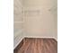 Walk-in closet with wood floor, wire shelving offering ample storage space at 11223 Huxley Ave, Orlando, FL 32837