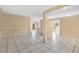 Generous living area showcasing tile flooring, perfect for diverse living arrangements and activities at 11223 Huxley Ave, Orlando, FL 32837
