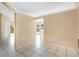 Spacious living area with tile flooring, perfect for flexible living and entertaining at 11223 Huxley Ave, Orlando, FL 32837