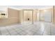 Expansive living room with tile flooring, creating an inviting space for gatherings and relaxation at 11223 Huxley Ave, Orlando, FL 32837