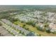 An aerial view reveals a well-planned community with homes nestled among mature trees, providing a sense of privacy and tranquility at 116 Douglas St, Edgewater, FL 32141