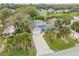Overhead shot of house showing front yard, driveway, and mature landscaping at 116 Douglas St, Edgewater, FL 32141