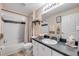 Bathroom featuring a vanity with a sink, toilet, and a shower/tub with a curtain at 116 Douglas St, Edgewater, FL 32141