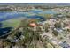 Gorgeous aerial shot of a home nestled on a lakefront property at 1330 Shelter Rock Rd, Orlando, FL 32835