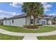 Attractive home with lush lawn, sidewalk access, and vibrant landscaping at 1380 Patterson Ter, Lake Mary, FL 32746