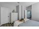 Bedroom showcasing a dresser and white doors, offering storage and access to other rooms at 15373 Murcott Harvest Loop, Winter Garden, FL 34787