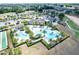 Aerial view of the community pool and recreational facilities, showcasing a resort-style living experience at 1905 Estuary Ln, Kissimmee, FL 34747