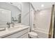Cozy bathroom with tiled shower, granite countertops, and brushed nickel fixtures at 1905 Estuary Ln, Kissimmee, FL 34747
