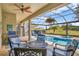 Relaxing outdoor pool and spa area with patio, ceiling fan, grill and comfortable seating area, perfect for entertaining guests at 1905 Estuary Ln, Kissimmee, FL 34747