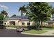 Community clubhouse with ample parking and lovely landscaping, offering residents a social hub at 2051 Town Pasture Dr, Eustis, FL 32726