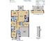 Floor plan features a primary suite, three bedrooms, a kitchen, dining room, living room, and two-car garage at 2051 Town Pasture Dr, Eustis, FL 32726