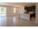 Open floor plan featuring a living room, dining area, and a kitchen with stainless steel appliances at 2051 Town Pasture Dr, Eustis, FL 32726
