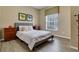 Inviting bedroom with hardwood flooring and modern decor at 2328 Caravelle Cir, Kissimmee, FL 34746