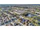 Wide aerial view of property's location within the neighborhood, near shopping and highway at 3001 Bellingham Dr, Orlando, FL 32825