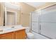 Bathroom featuring a vanity, toilet, and a shower and tub combo with sliding doors at 3001 Bellingham Dr, Orlando, FL 32825